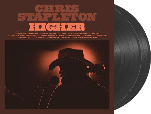 Vinyl record with 'Chris Stapleton Higher' album cover featuring a silhouette of a person in a cowboy hat.