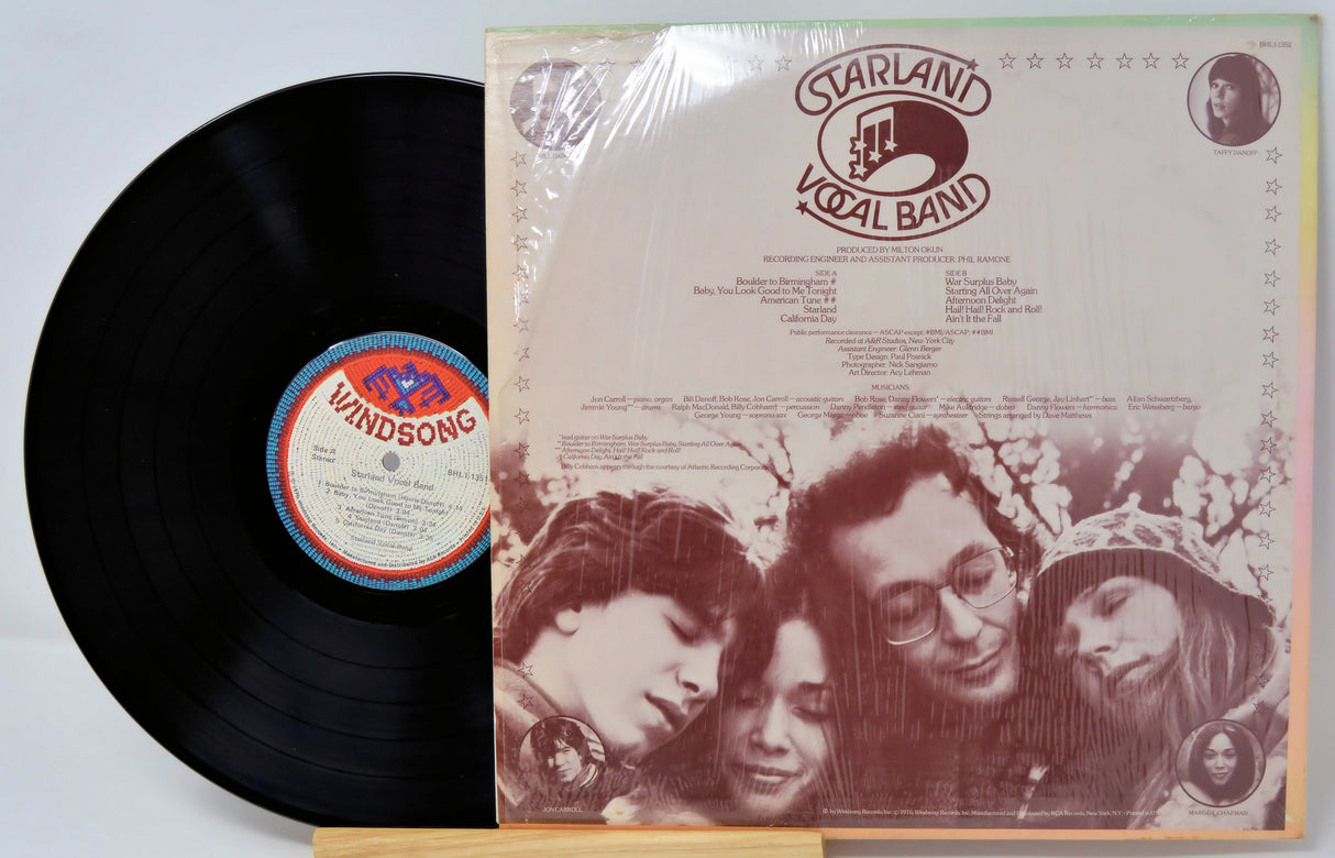 Vinyl record with 'Starland Vocal Band' album cover featuring a group of people.