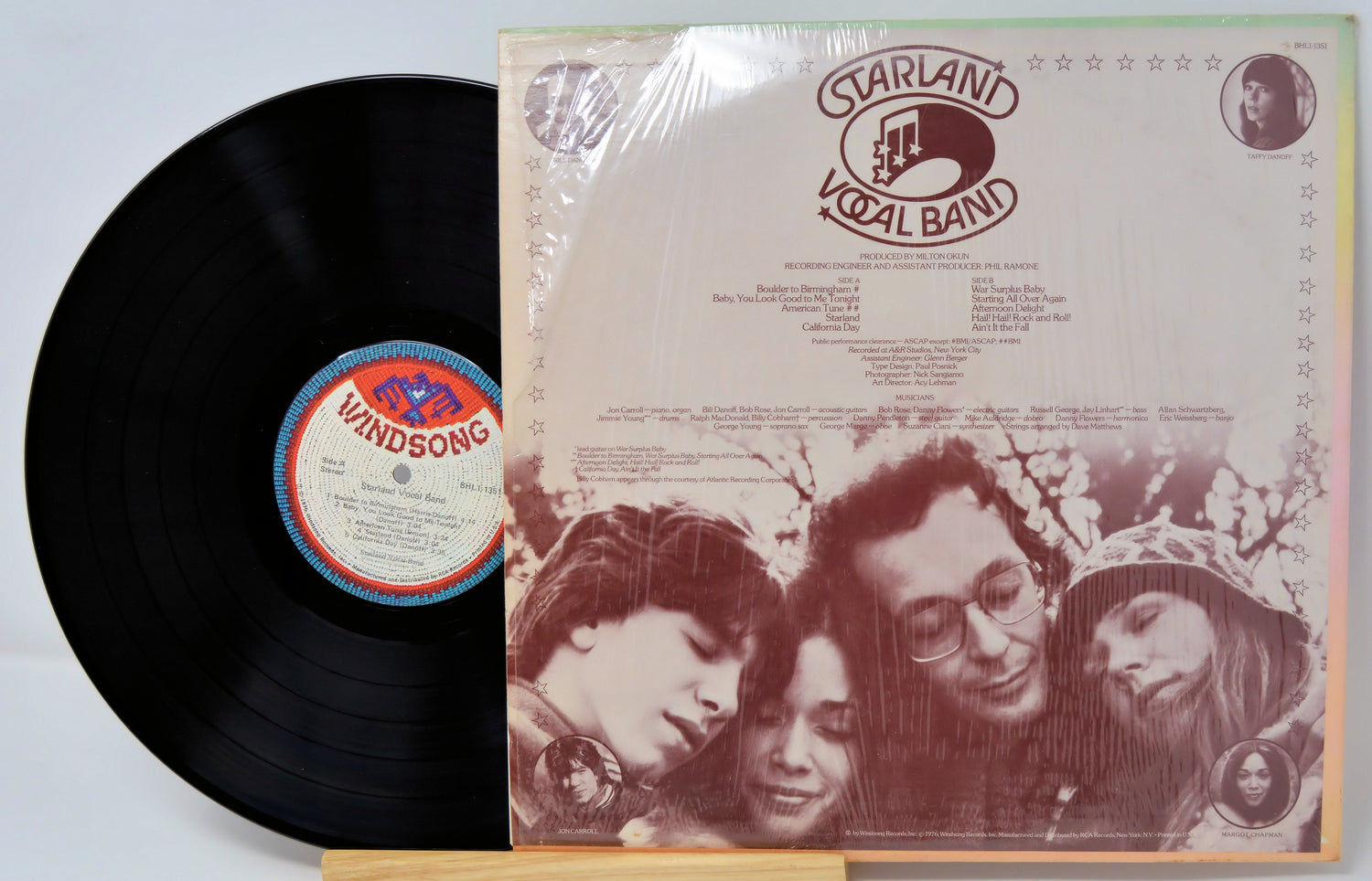Vinyl record with 'Starland Vocal Band' album cover featuring a group of people.