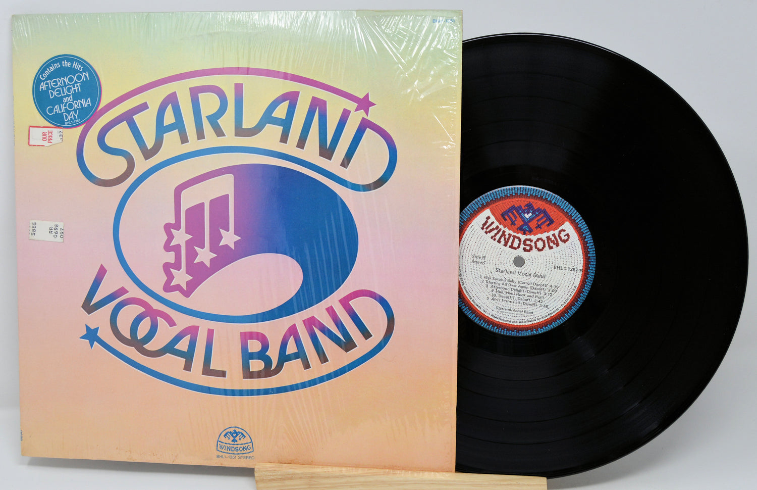 Vinyl record with 'Starland Vocal Band' cover on a white background