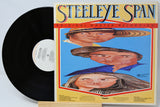 A vinyl record partially pulled from its album cover, showing the black record on the left and the cover on the right. The cover features the title 'Steeleye Span' in large stylized lettering above an illustrated portrait collage on a light background.