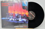 Front cover and vinyl record of Steely Dan's Northeast Corridor Live! album showing a concert stage with band