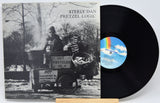 Vinyl record with Steely Dan album cover showing a hot pretzel cart and record disc.