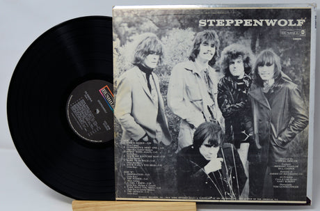 Vinyl record with Steppenwolf album cover featuring band members outdoors.