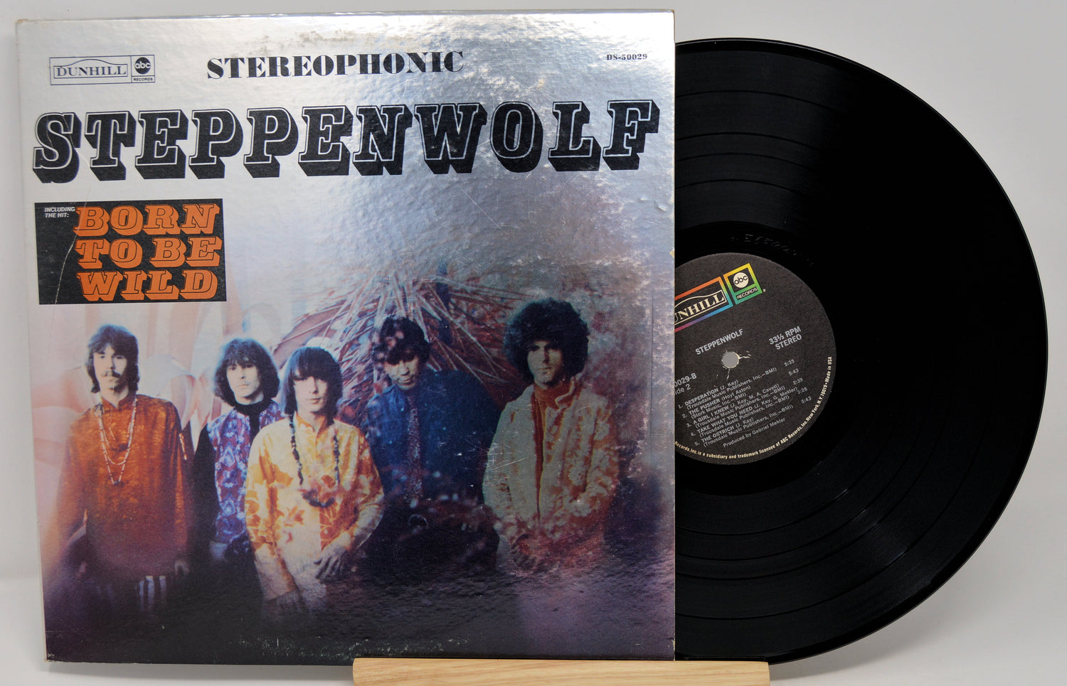 Vinyl record with 'Steppenwolf' album cover featuring band members and text.