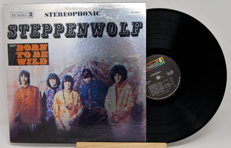 Vinyl record with 'Steppenwolf' album cover featuring band members and text.