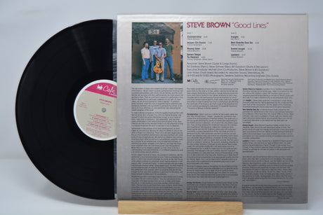 Vinyl record 'Steve Brown Good Lines' with cover featuring text and a photo of four people on a gray background