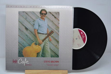Vinyl record with cover featuring a man holding a guitar, labeled 'Steve Brown Good Lines'.