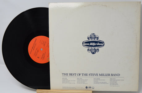 Vinyl record with cover featuring 'The Best of the Steve Miller Band' on a light gray background