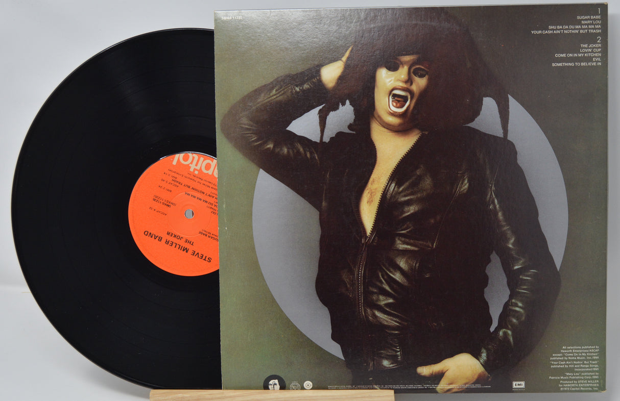 Vinyl record by Steve Miller titled The Joker with a person wearing a leather jacket on the back cover