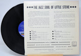Vinyl record 'Stevie Wonder Jazz Soul of Little Stevie' with its back cover displaying text on a white background