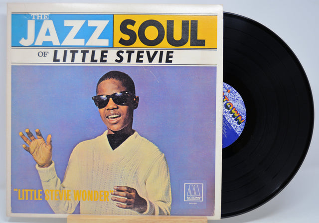 Vinyl record with 'The Jazz Soul of Little Stevie' album cover featuring a person in sunglasses.