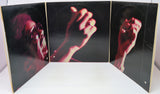 Album cover with a split-screen design showing a person's face and hands on a black background.