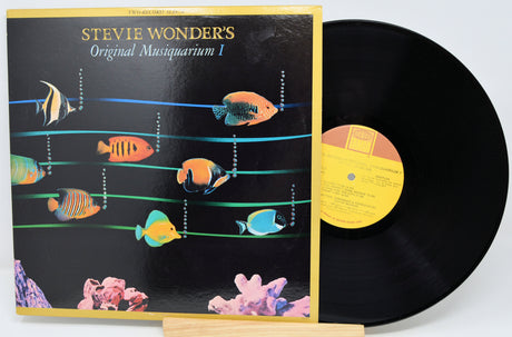 Vinyl record with a black and white cover featuring an intimate pose.