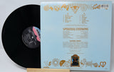 Vinyl record with a blue cover featuring text and decorative elements.