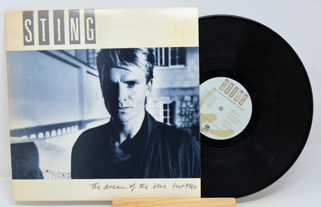 Vinyl record with Sting album cover featuring a portrait of a person.