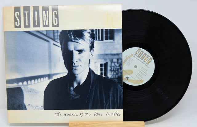 Vinyl record with Sting album cover featuring a portrait of a person.