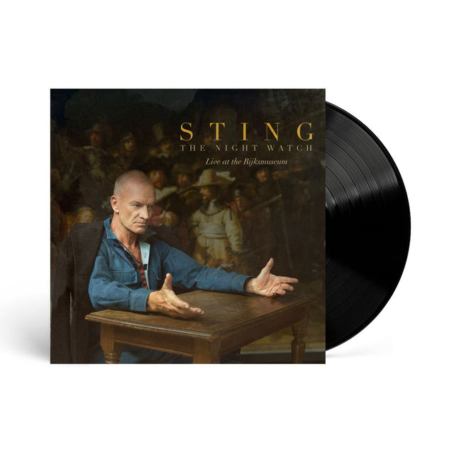 Vinyl record with Sting album cover featuring a man in a blue jacket sitting at a table.
