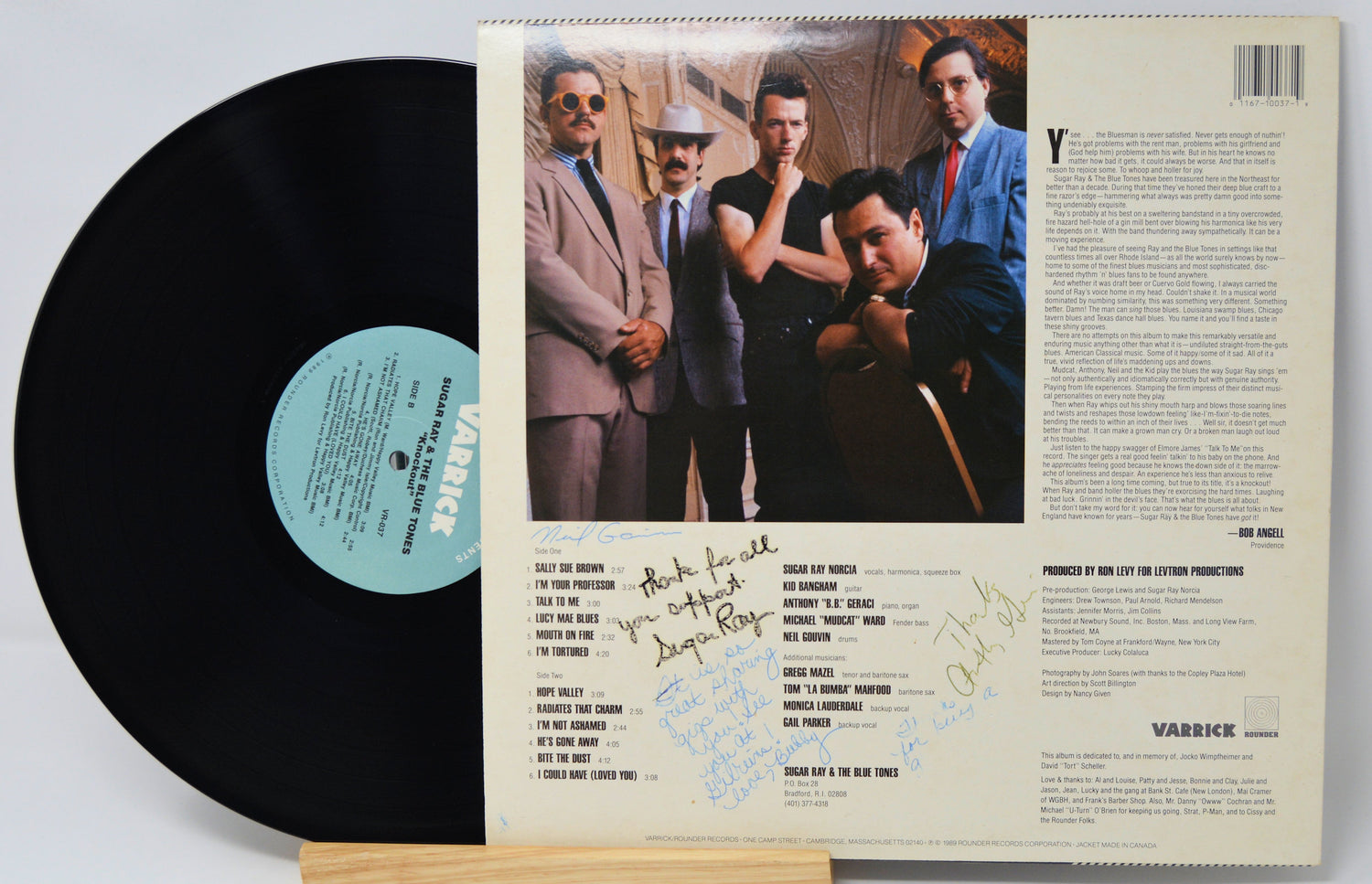 Vinyl record 'Sugar Ray & Blue Tones - Knockout' with back cover featuring a group of people and text