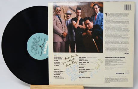 Vinyl record 'Sugar Ray & Blue Tones - Knockout' with back cover featuring a group of people and text