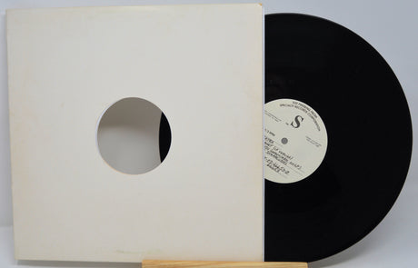 Vinyl record with a white label and beige sleeve on a white background