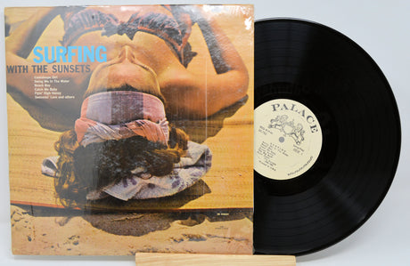 Front cover and vinyl record of Surfing With The Sunsets LP featuring a woman lying on the beach