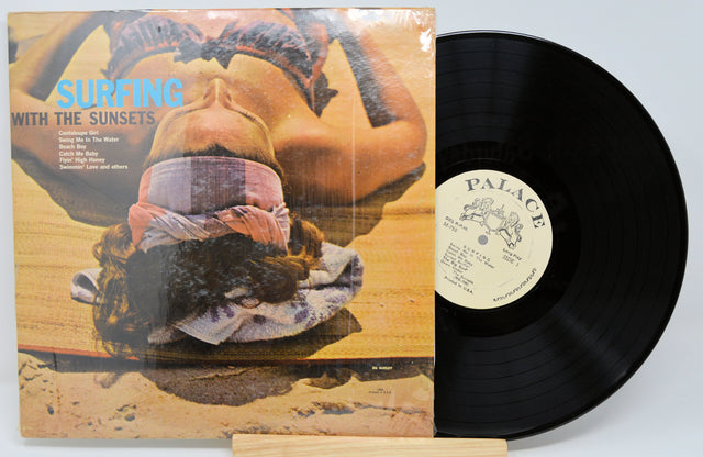 Front cover and vinyl record of Surfing With The Sunsets LP featuring a woman lying on the beach