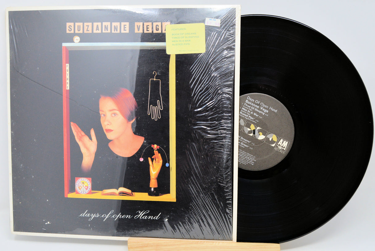 Vinyl record with cover featuring a person and text on a white background