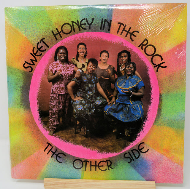 Album cover of 'Sweet Honey in the Rock' with a group of women on a colorful background