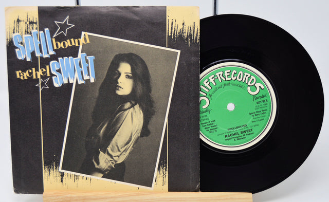 Vinyl record and cover with 'Spellbound Rachel Sweet' on a white background