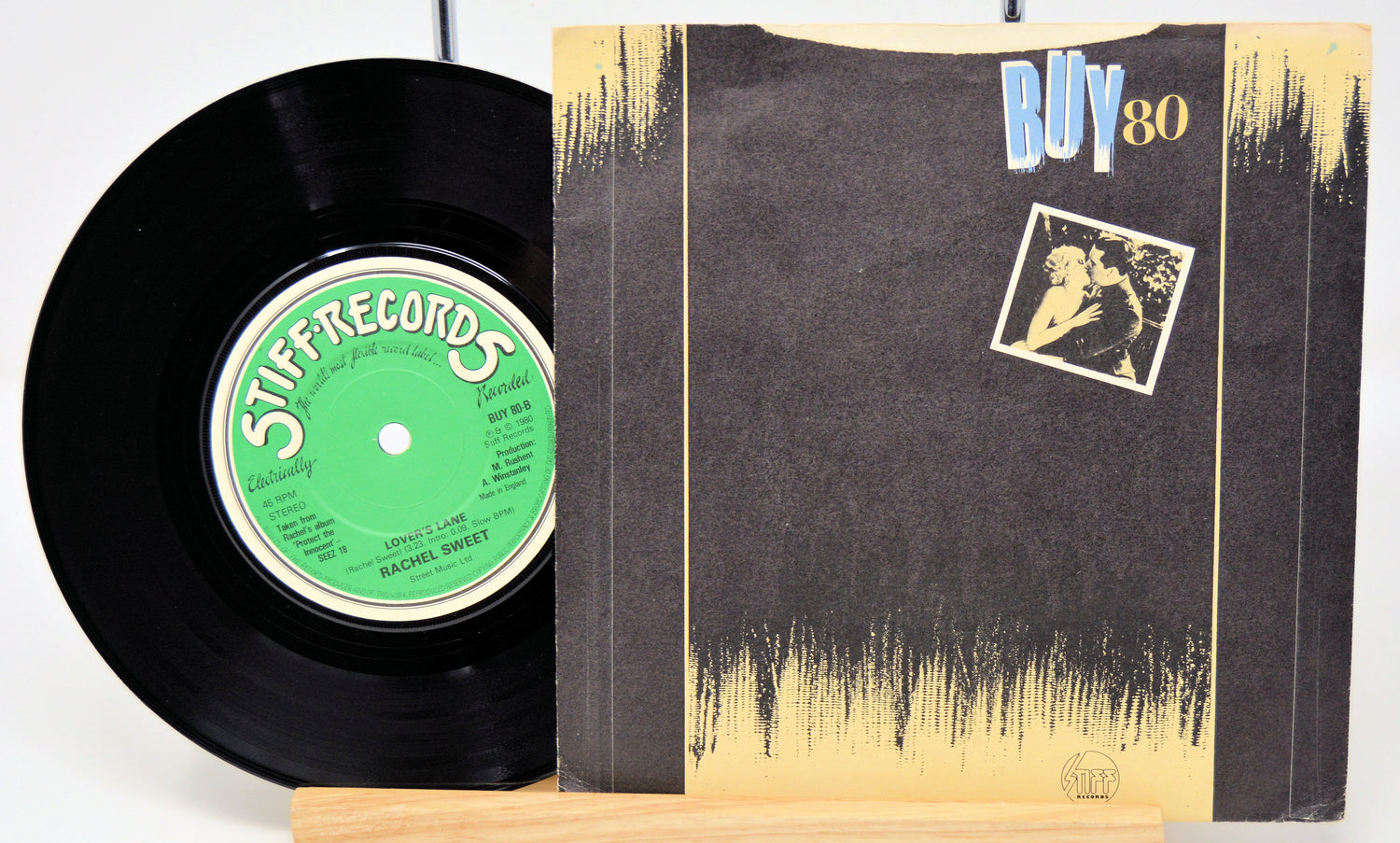 Vinyl record with 'Stiff Records' label and cover displaying 'BUY 80' text.