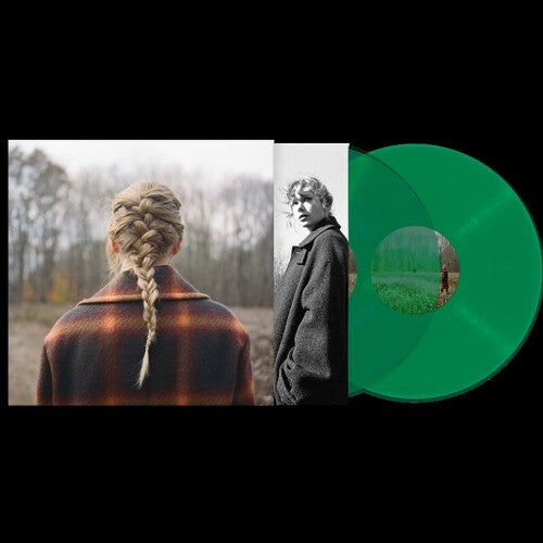 A green vinyl record with a sleeve featuring two black and white images of a person with a braided hairdo in a natural setting.