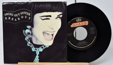 Vinyl record with cover featuring a stylized face and 'Swing Out Sister Breakout' text.