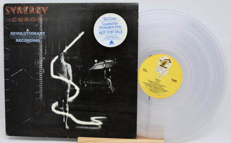 Vinyl record with cover featuring illustrations and 'The Who by Numbers' text