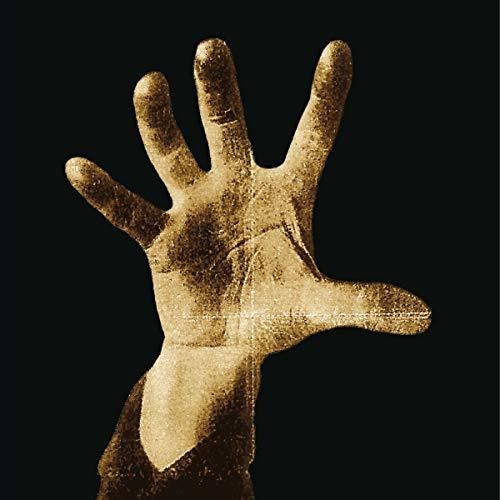Brown handprint on a black background