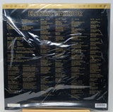 The back cover of the Electric Warrior vinyl record LP by Mobile Sound Lab, sealed in its original plastic shrink wrap. The cover is black with gold text and features a tracklist.