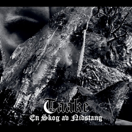 Black and white image of a forest with the text 'Taaake En Skog av Nidstang' displayed.