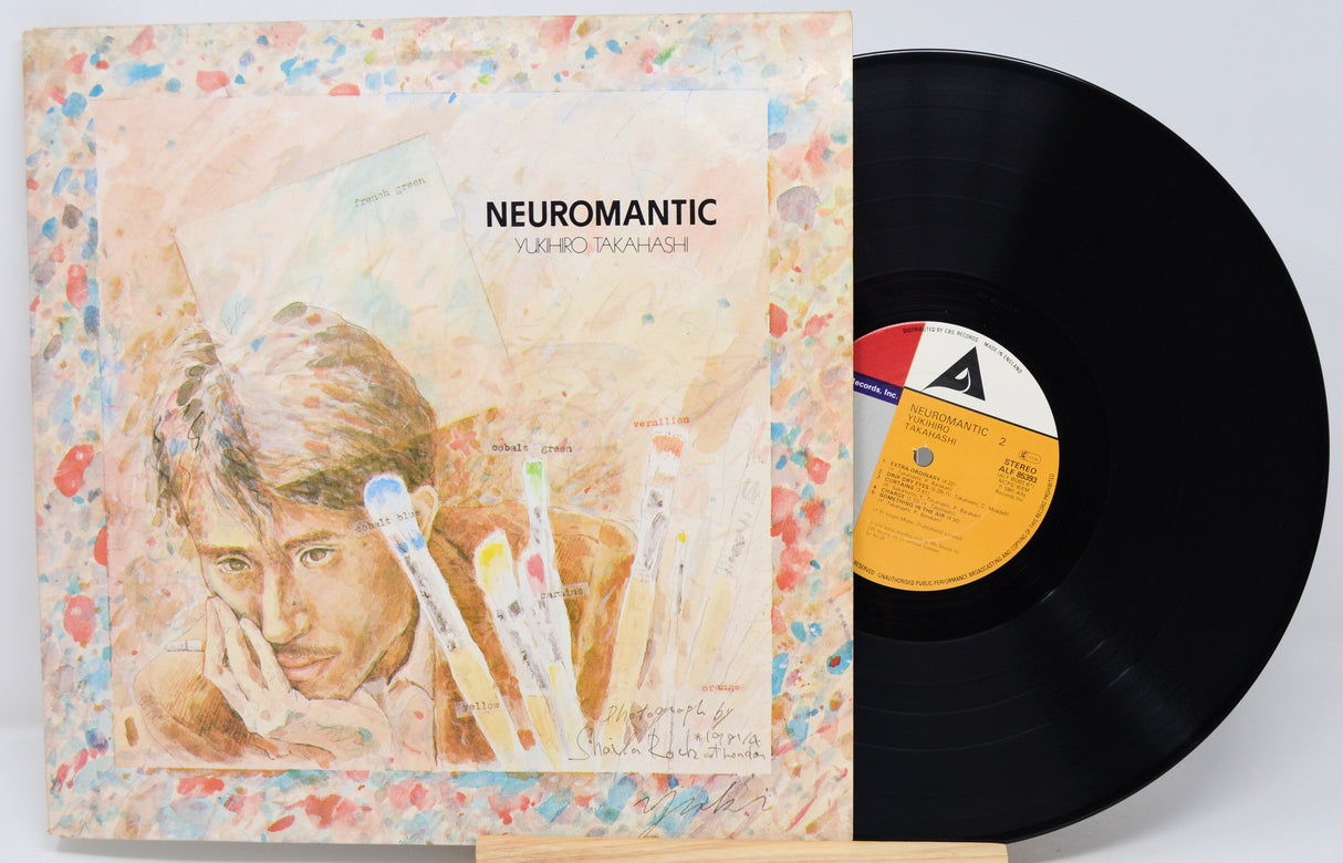 Vinyl record with cover titled 'Neuromantic' on a white background