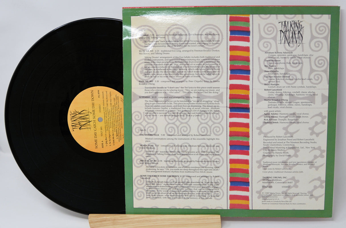 Talking Drums record with open album sleeve showing tracklist and credits