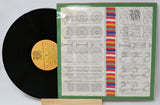 Talking Drums record with open album sleeve showing tracklist and credits