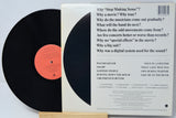 Vinyl record with a question set on the cover