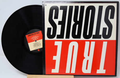 Vinyl record with a red and white cover featuring the text 'STORIES TRUE'.
