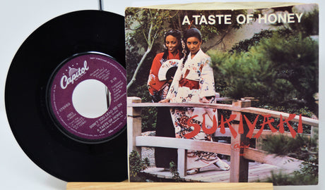 Vinyl record and cover titled 'A Taste of Honey' by Suryani on a white background