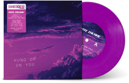 Purple vinyl record by Tate McRae titled 'Hung Up On You' with the cover showing a purple sky and clouds.
