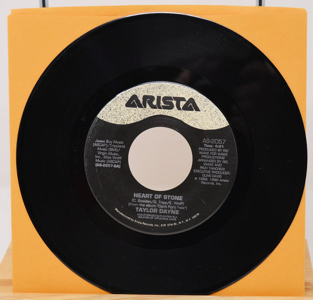 Taylor Dayne Heart Of Stone 7-inch vinyl single released by Arista Records in 1989 with orange sleeve