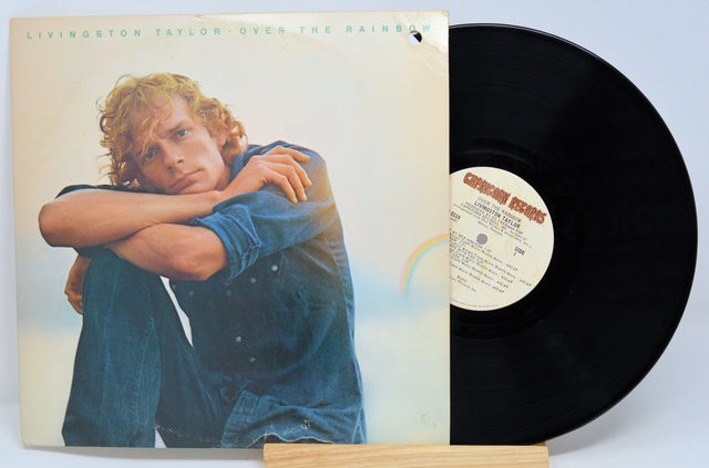 A used vinyl record titled 'Over The Rainbow' by Livingston Taylor, featuring the artist's photo on the cover.