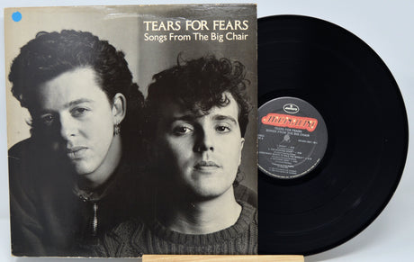 Vinyl record with 'Tears for Fears' album cover showing two faces.