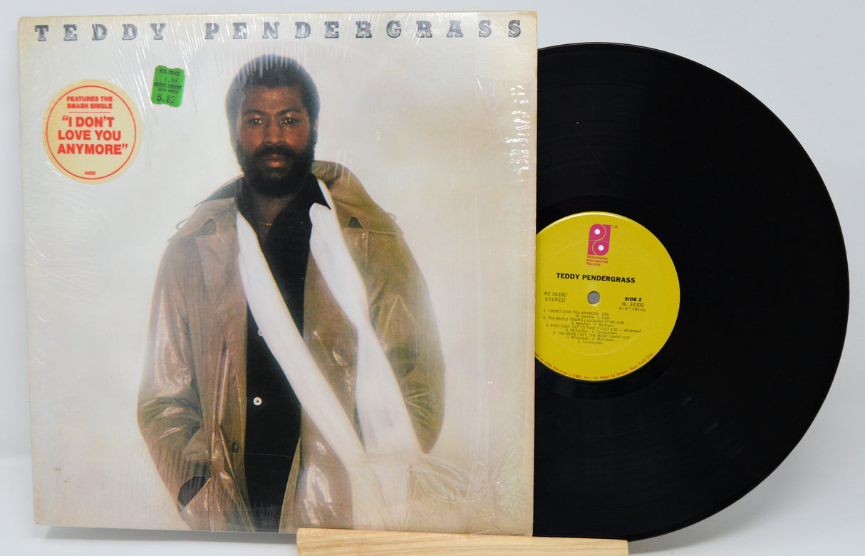 Vinyl record with cover featuring a man and album details