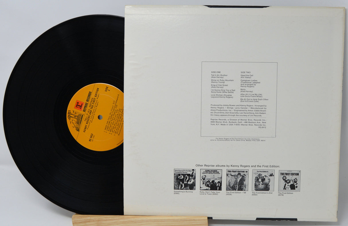 Back cover and vinyl record of Kenny Rogers & The First Edition's Tell It All Brother LP with tracklist and other album covers displayed