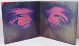 Inside gatefold album cover of 'Ten Years After Ssssh' with a stylized eye design on a textured surface